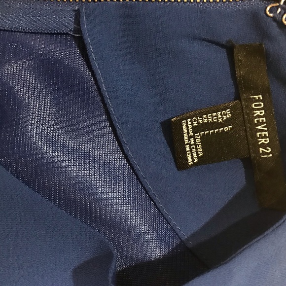 Never worn F21 skater dress with side cut outs. - Picture 4 of 4